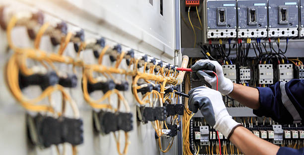 Professional Electrician technician working in Harrisonville, MO